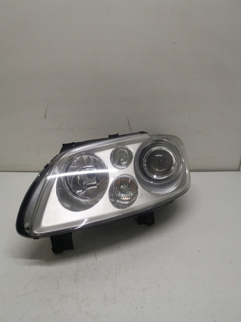 Frontscheinwerfer VW Touran 1T0941031F Links Scheinwerfer Headlight