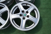 Load image into Gallery viewer, 4x Alufelge 15 Zoll 6.0" 5x100 38ET Glanz Silber 1U0601025 Skoda Octavia I Fabia FEL2665990004ux