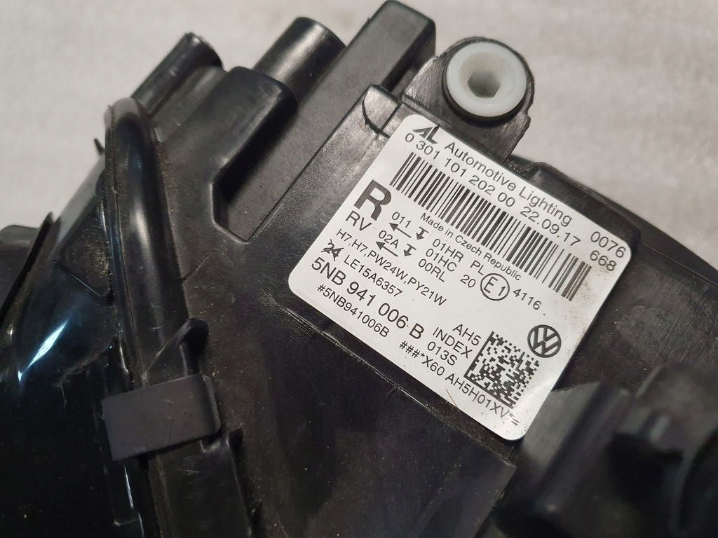 Frontscheinwerfer VW Tiguan Golf Sportsvan 5NB941006 Links Headlight