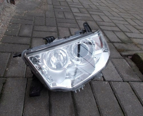 Frontscheinwerfer Mitsubishi Pajero Sport 8301A877 Links Scheinwerfer Headlight