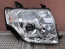 Frontscheinwerfer Mitsubishi Pajero IV 100-87873- Rechts Scheinwerfer Headlight