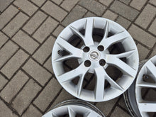 Load image into Gallery viewer, 4x Alufelge 15 Zoll 5.5" 4x100 40ET Glanz Silber 87169090 Nissan Micra I FEL7060816306ou