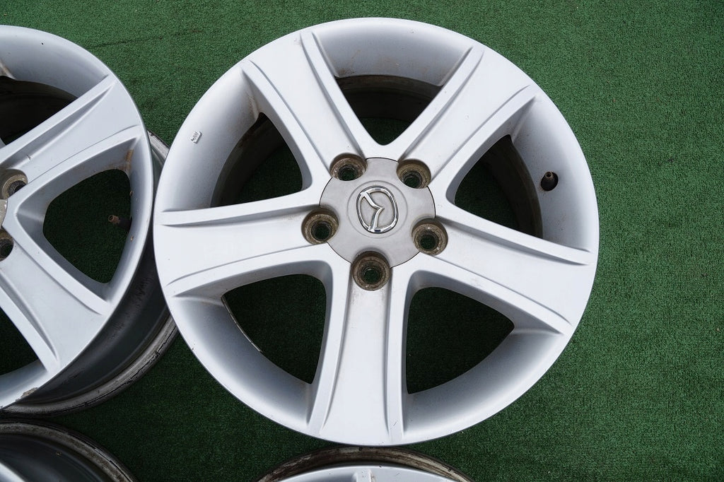 4x Alufelge 16 Zoll 7.0" 5x114.3 55ET Glanz Silber 9965637060 Mazda Mx-5 I FEL3424145056pc
