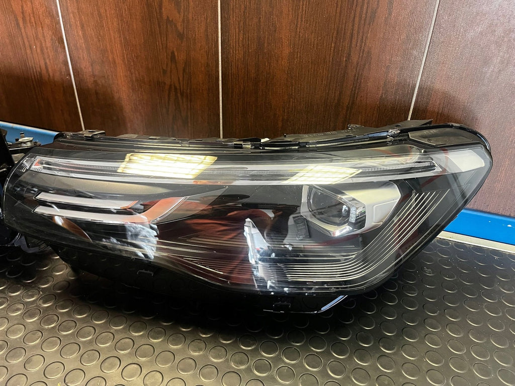 Frontscheinwerfer VW Tiguan 030113223200 571941005A 571941006A Ein Satz