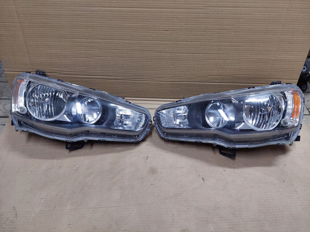 Frontscheinwerfer Mitsubishi Outlander II Ein Stück (Rechts oder Links)