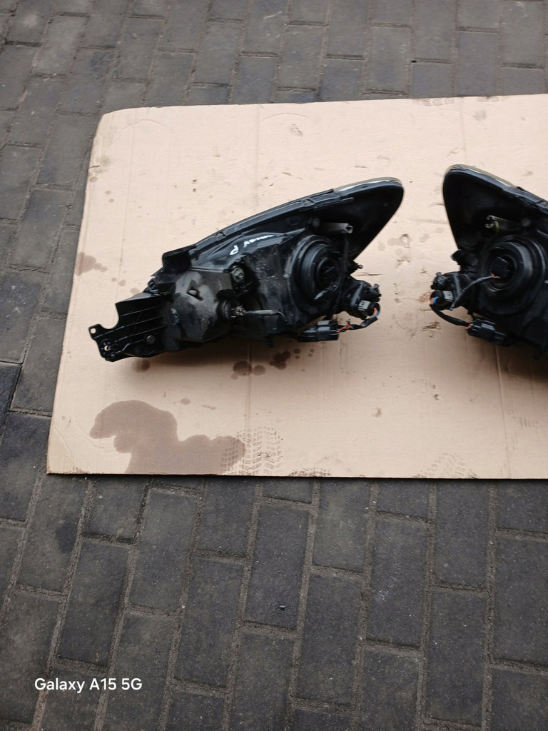 Frontscheinwerfer Mitsubishi Lancer VII I Ein Satz Scheinwerfer Headlight SCH7761310468ga