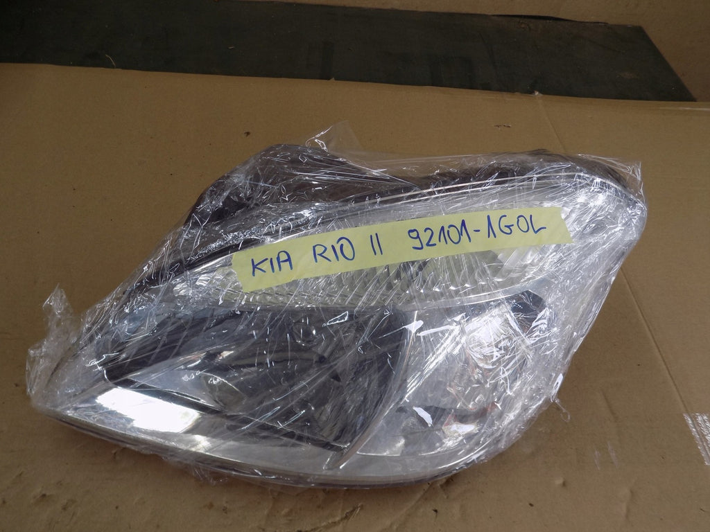 Frontscheinwerfer Kia Rio II 921011G0L Links Scheinwerfer Headlight