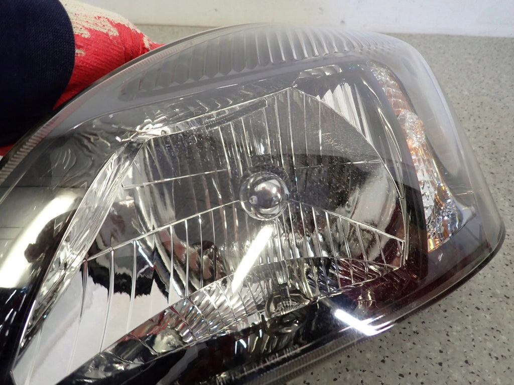 Frontscheinwerfer Kia Rio II Links Scheinwerfer Headlight SCH5605317179li