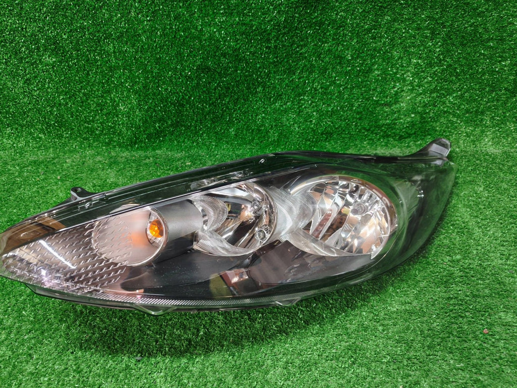 Frontscheinwerfer Ford Fiesta I 1EJ24704501 8A6113W030AJ Links Headlight SCH5764759308gm