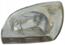 Frontscheinwerfer Kia Sportage II Links Scheinwerfer Headlight
