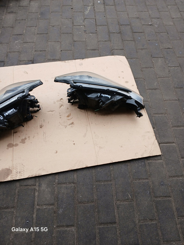 Frontscheinwerfer Mitsubishi Lancer VII I Ein Satz Scheinwerfer Headlight SCH7761310468ga