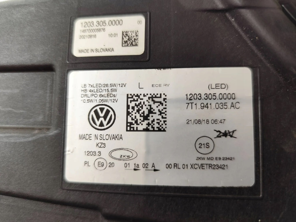 Frontscheinwerfer VW Transporter Caravelle 7T1941035AC 12033050000 Links