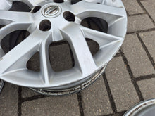 Load image into Gallery viewer, 4x Alufelge 15 Zoll 5.5" 4x100 40ET Glanz Silber 87169090 Nissan Micra I FEL7060816306ou