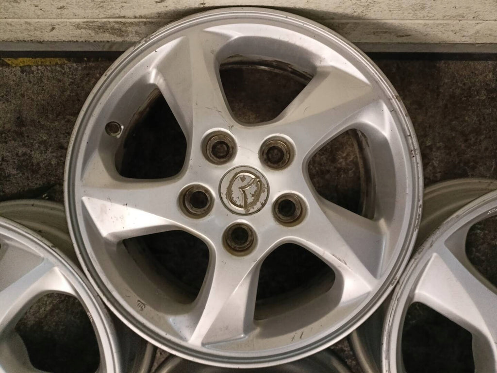 4x Alufelge 15 Zoll 6.0" 5x114.3 50ET Glanz Silber 560-C75 Kia Mpv Premacy FEL6644407889ve
