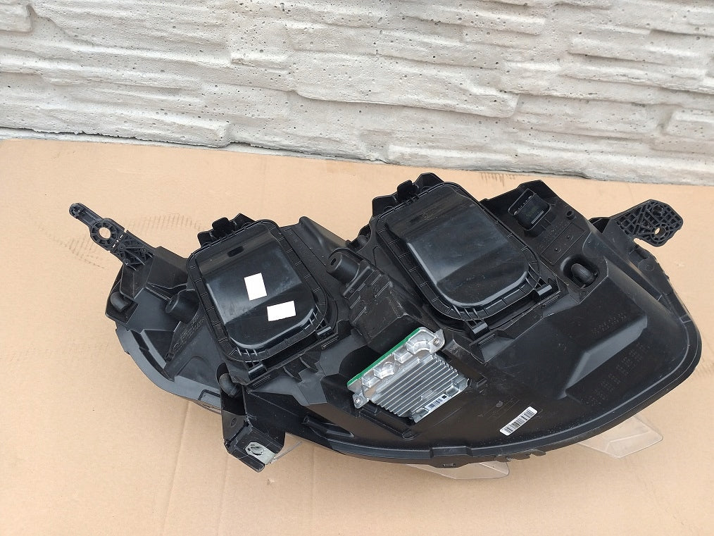 Frontscheinwerfer Opel Zafira Vivaro 00218275-01 Xenon Links Headlight