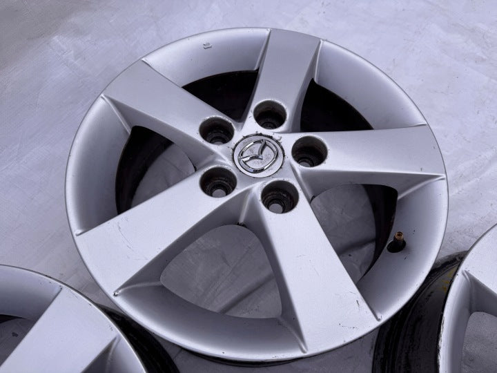 4x Alufelge 15 Zoll 6.0" 5x114.3 52 5ET Silber Mazda I Rim Wheel FEL1253561721mc