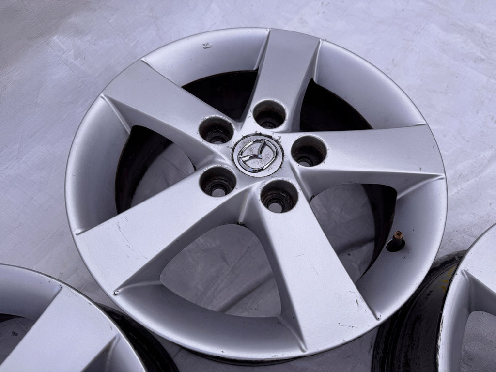 4x Alufelge 15 Zoll 6.0" 5x114.3 52 5ET Silber Mazda I Rim Wheel FEL1253561721mc