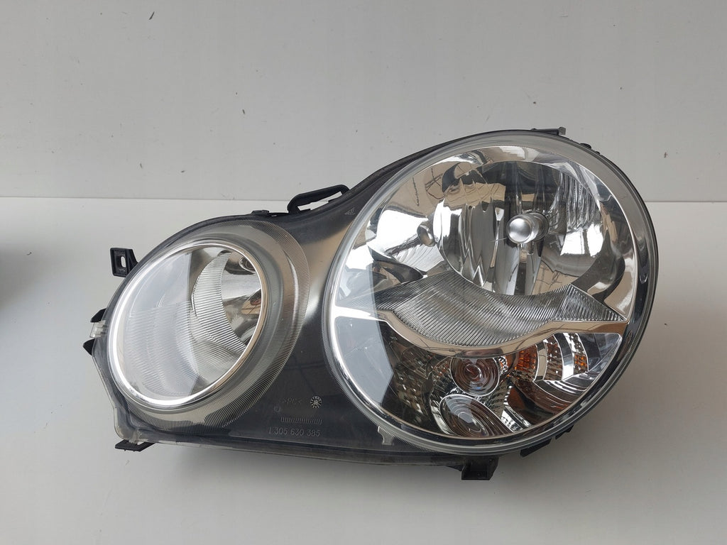 Frontscheinwerfer VW Polo IV 6Q1941007M Links Scheinwerfer Headlight