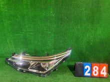 Load image into Gallery viewer, Frontscheinwerfer Toyota Corolla 8115002L50 Links Scheinwerfer Headlight SCH2874279858sk