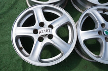 Load image into Gallery viewer, 4x Alufelge 15 Zoll 6.0" 5x100 38ET Glanz Silber 1U0601025 Skoda Octavia I Fabia FEL2665990004ux