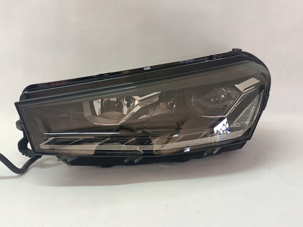 Frontscheinwerfer Skoda Fabia 6VB941015 Links Scheinwerfer Headlight SCH1315775486km