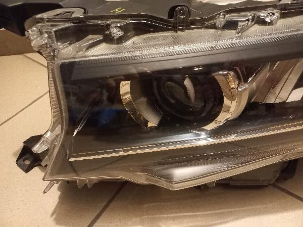 Frontscheinwerfer Toyota Land Cruiser Links Scheinwerfer Headlight SCH6767084219xs