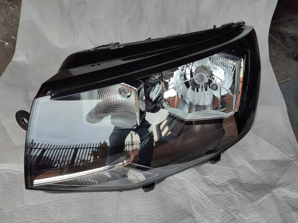 Frontscheinwerfer VW Transporter Caravelle 7E1941015AD Links Headlight