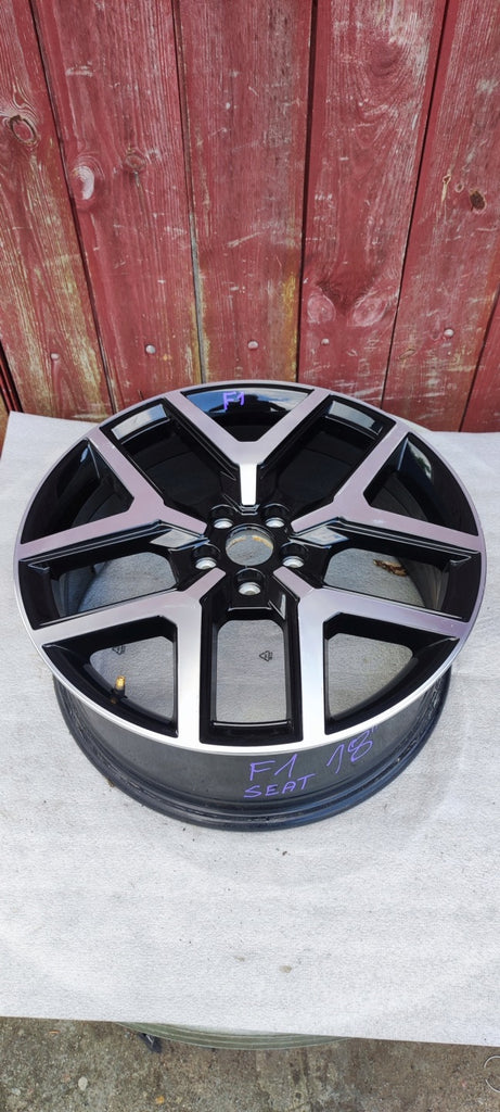 1x Alufelge 18 Zoll 7.0" 5x100 47ET Glanz Schwarz 6F9601025B Seat Arona FEL7025294056dk