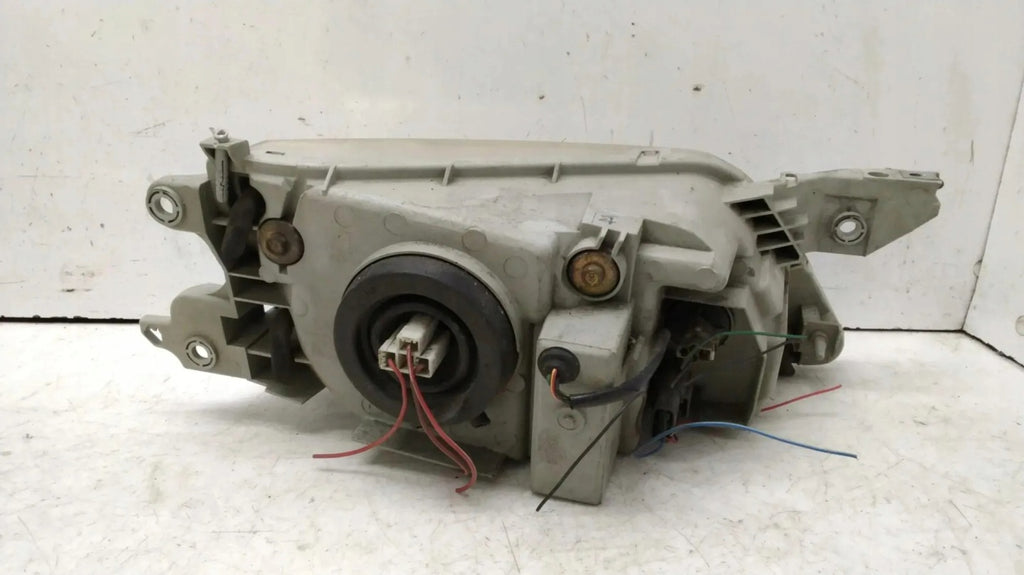 Frontscheinwerfer Mazda Premacy P1989 Links Scheinwerfer Headlight SCH9229674770zd