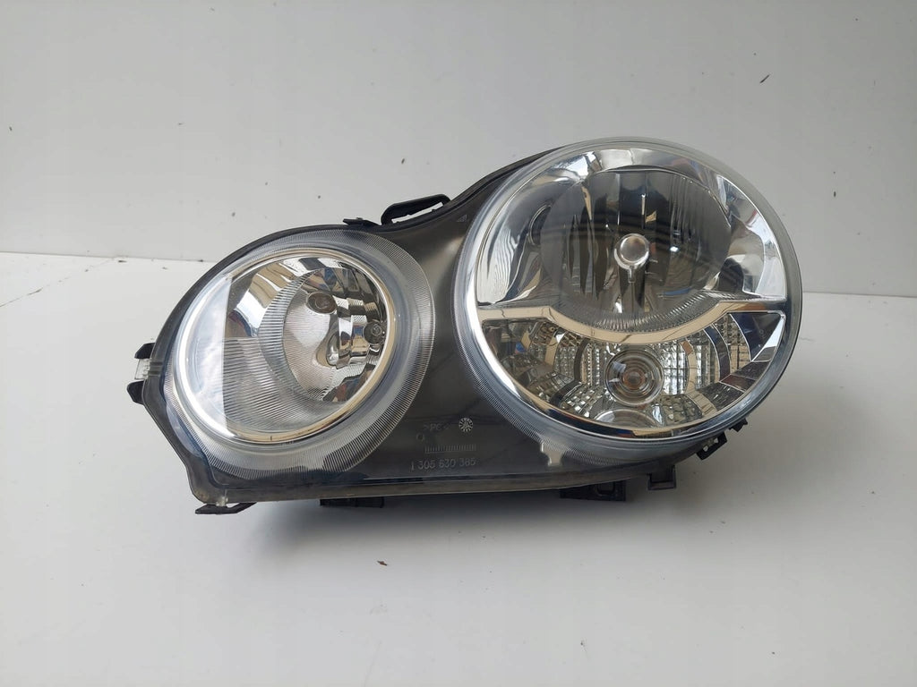 Frontscheinwerfer VW Polo IV 6Q1941007M Links Scheinwerfer Headlight