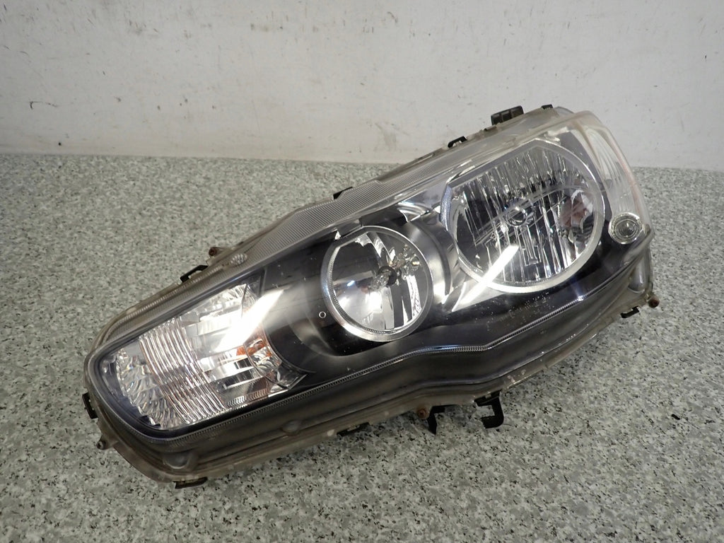 Frontscheinwerfer Mitsubishi Lancer VIII Links Scheinwerfer Headlight