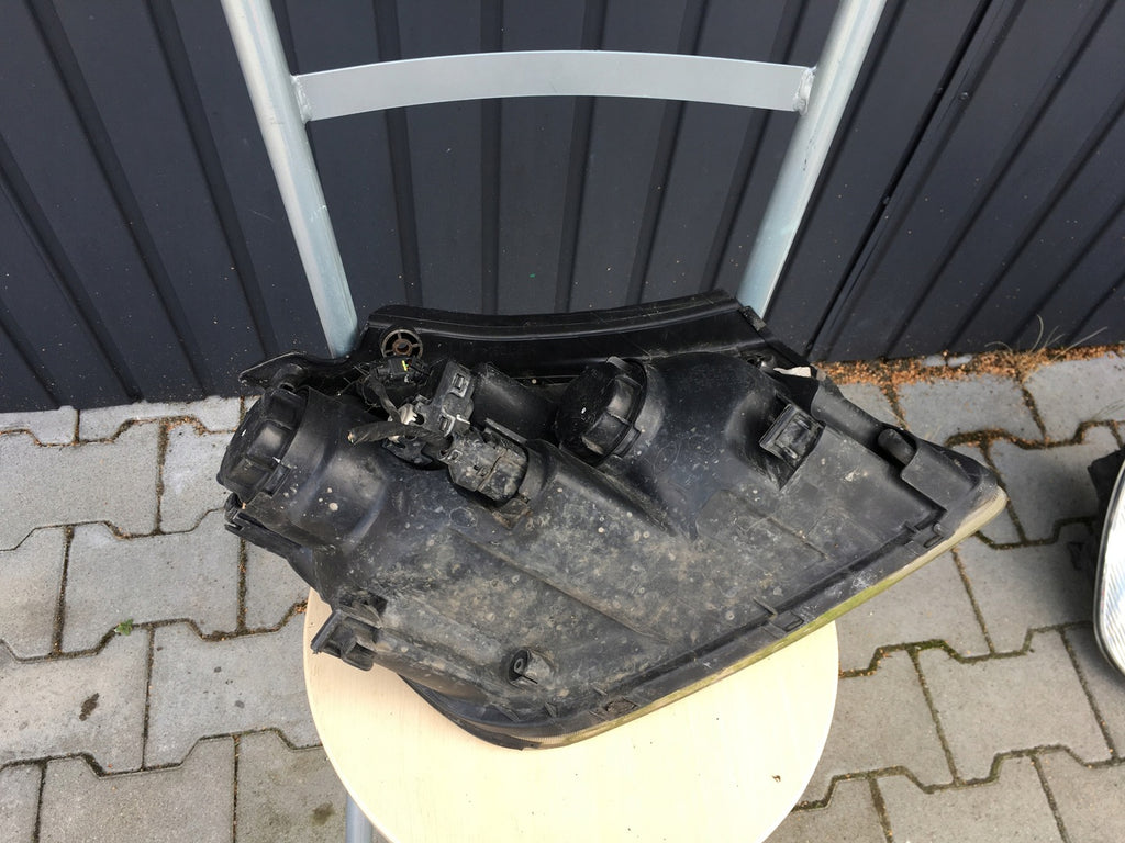 Frontscheinwerfer Kia Carens III Links Scheinwerfer Headlight