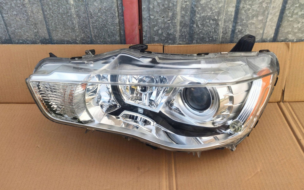Frontscheinwerfer Mitsubishi Outlander II P8597 Xenon Rechts oder Links