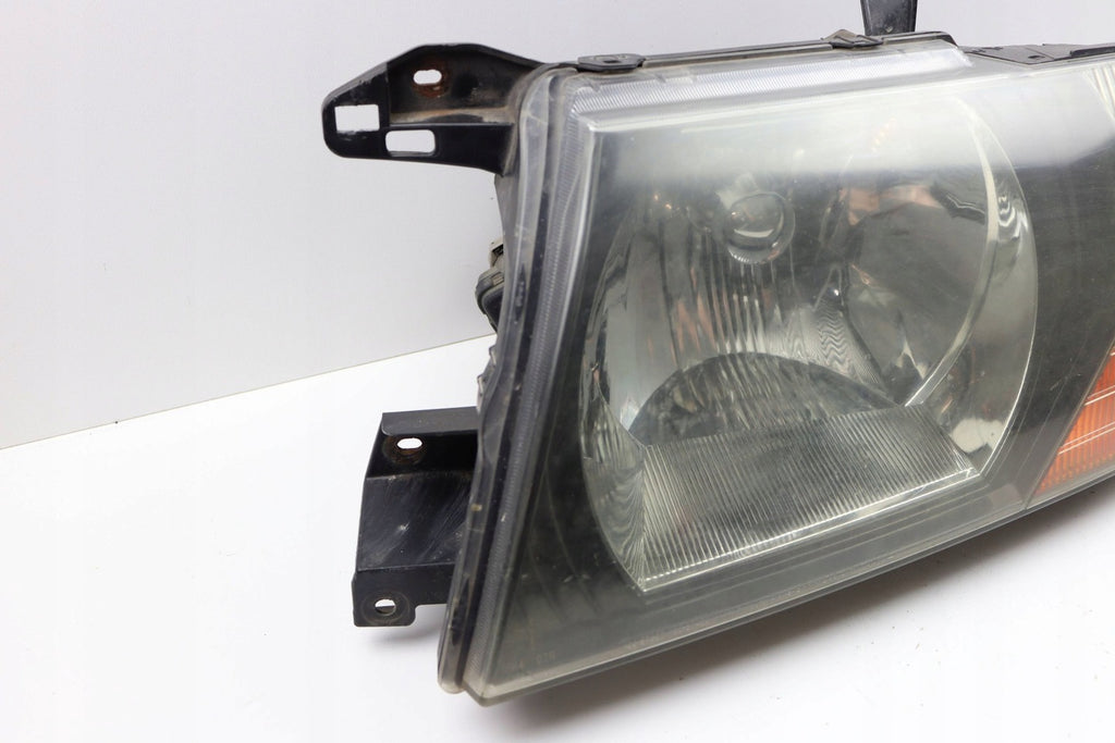 Frontscheinwerfer Mitsubishi Pajero III 10087420 Links Scheinwerfer Headlight