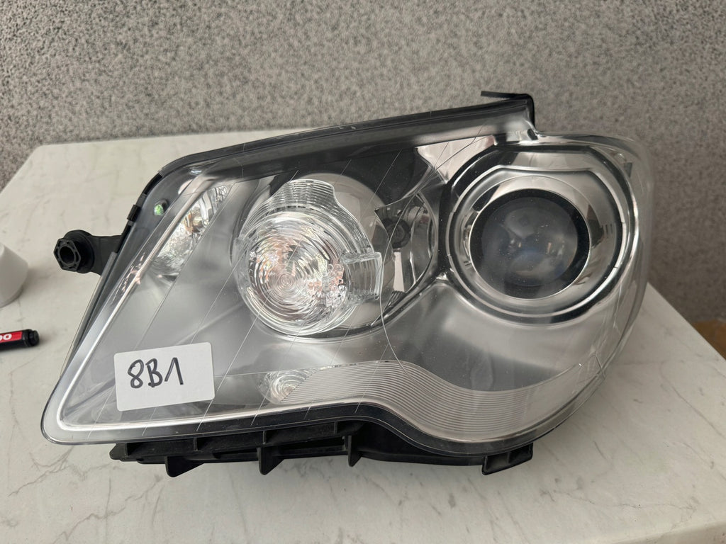 Frontscheinwerfer VW Touran Links Scheinwerfer Headlight