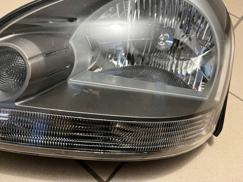 Frontscheinwerfer Hyundai Tucson Links Scheinwerfer Headlight