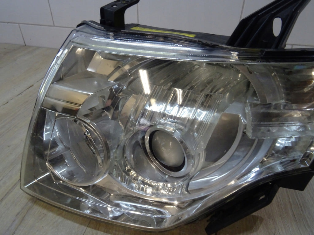 Frontscheinwerfer Mitsubishi Pajero IV 100-87875 Xenon Rechts oder Links