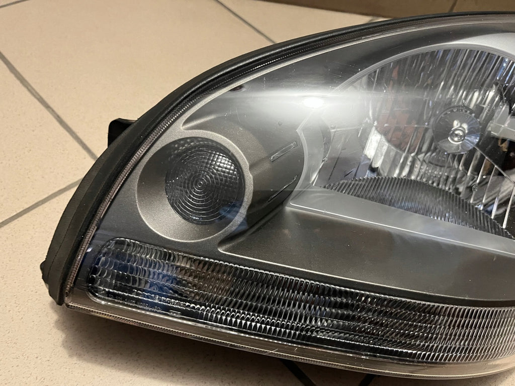 Frontscheinwerfer Hyundai Tucson Links Scheinwerfer Headlight