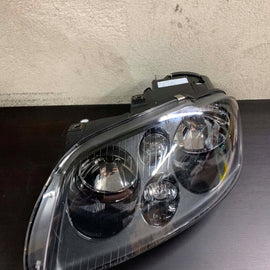 Frontscheinwerfer VW Touran Caddy I Links Scheinwerfer Headlight SCH6380839814bg