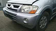 Laden Sie das Bild in den Galerie-Viewer, Frontscheinwerfer Mitsubishi Pajero III OE222333 Ein Stück (Rechts oder Links)