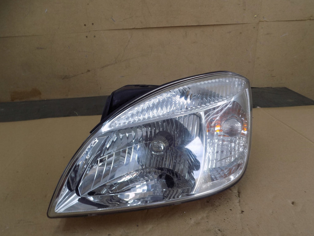Frontscheinwerfer Kia Rio II 921011G0L Links Scheinwerfer Headlight