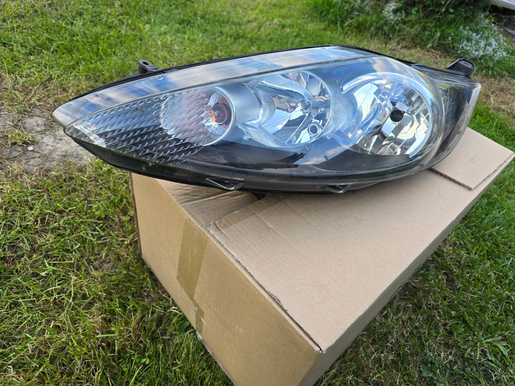 Frontscheinwerfer Ford Fiesta I 1EJ24704501 8A6113W030AF Links Headlight SCH7644227574nl