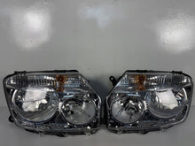 Laden Sie das Bild in den Galerie-Viewer, Frontscheinwerfer Dacia Duster 2606000069R Links Scheinwerfer Headlight SCH1262077488xo