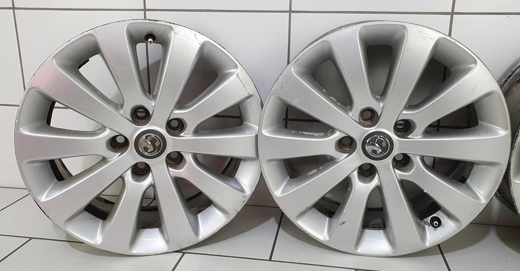 4x Alufelge 17 Zoll 7.0" 5x115 44ET Silber 13276347 Opel Astra J Rim Wheel