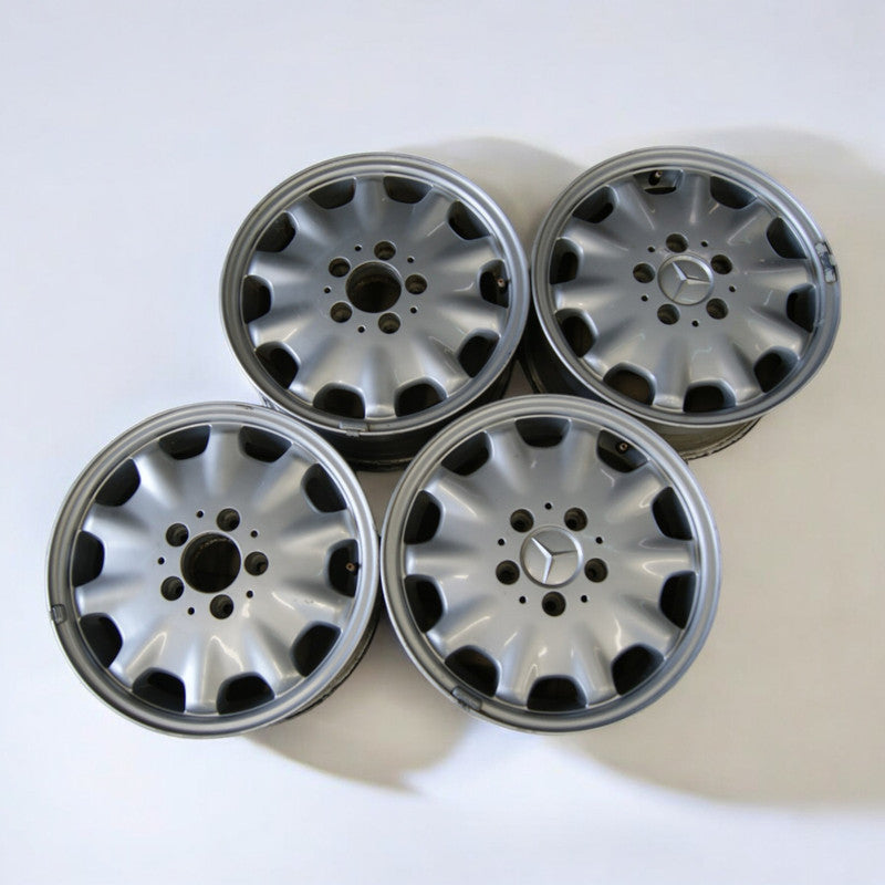 4x Alufelge 15 Zoll 7.0" 5x112 37ET Glanz Silber 2104010102 Mercedes-Benz W210