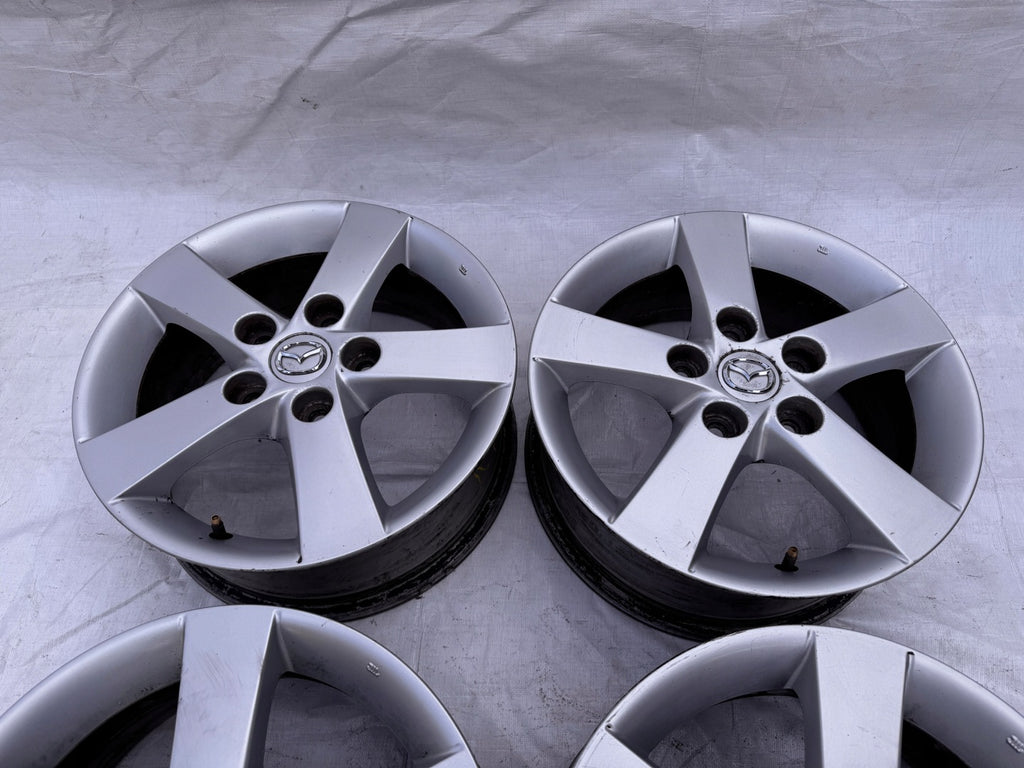 4x Alufelge 15 Zoll 6.0" 5x114.3 52 5ET Silber Mazda I Rim Wheel FEL1253561721mc