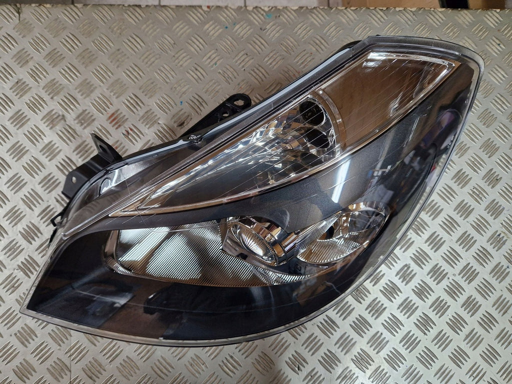 Frontscheinwerfer Renault Clio III 7701070491 Links Scheinwerfer Headlight