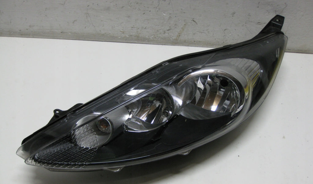 Frontscheinwerfer Ford Fiesta I 8A61-13W030-AH Links Scheinwerfer Headlight SCH7305826168fy
