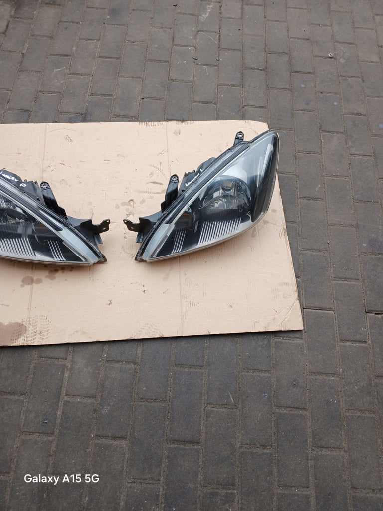 Frontscheinwerfer Mitsubishi Lancer VII I Ein Satz Scheinwerfer Headlight SCH7761310468ga