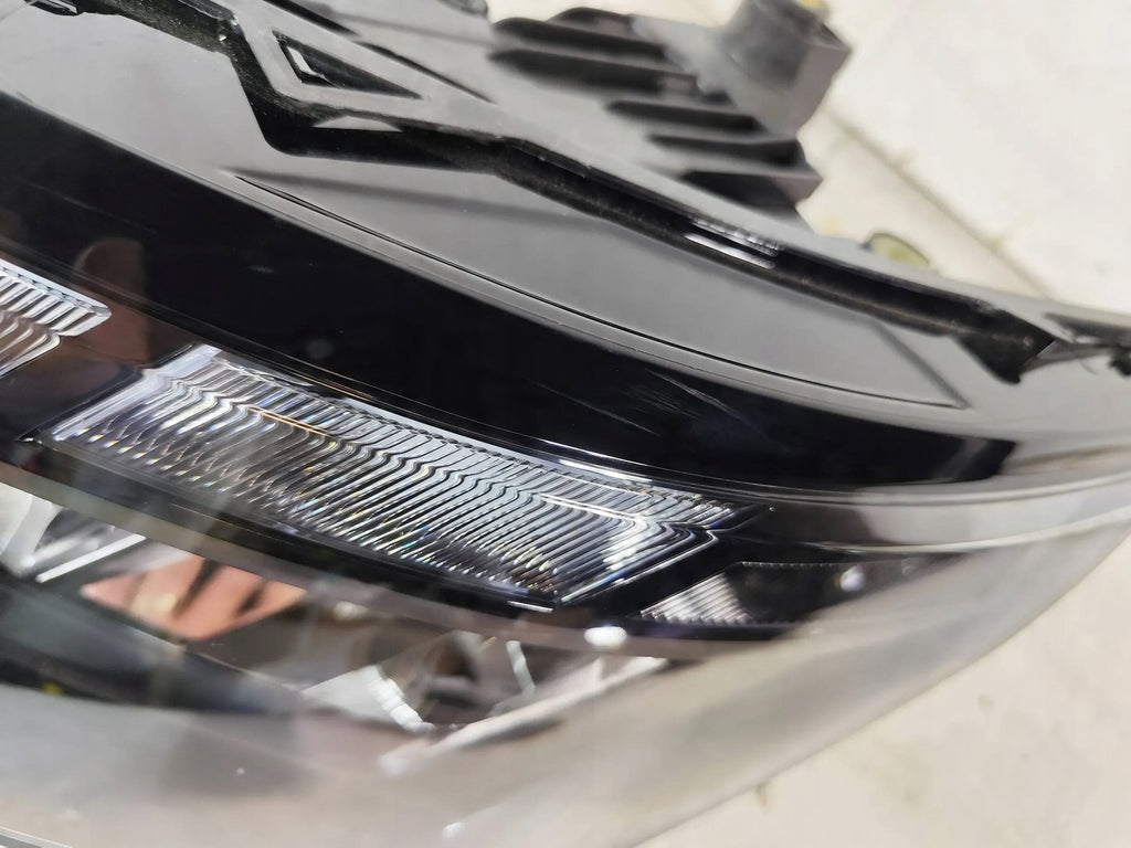 Frontscheinwerfer VW Transporter Caravelle 7T1941035AC 12033050000 Links